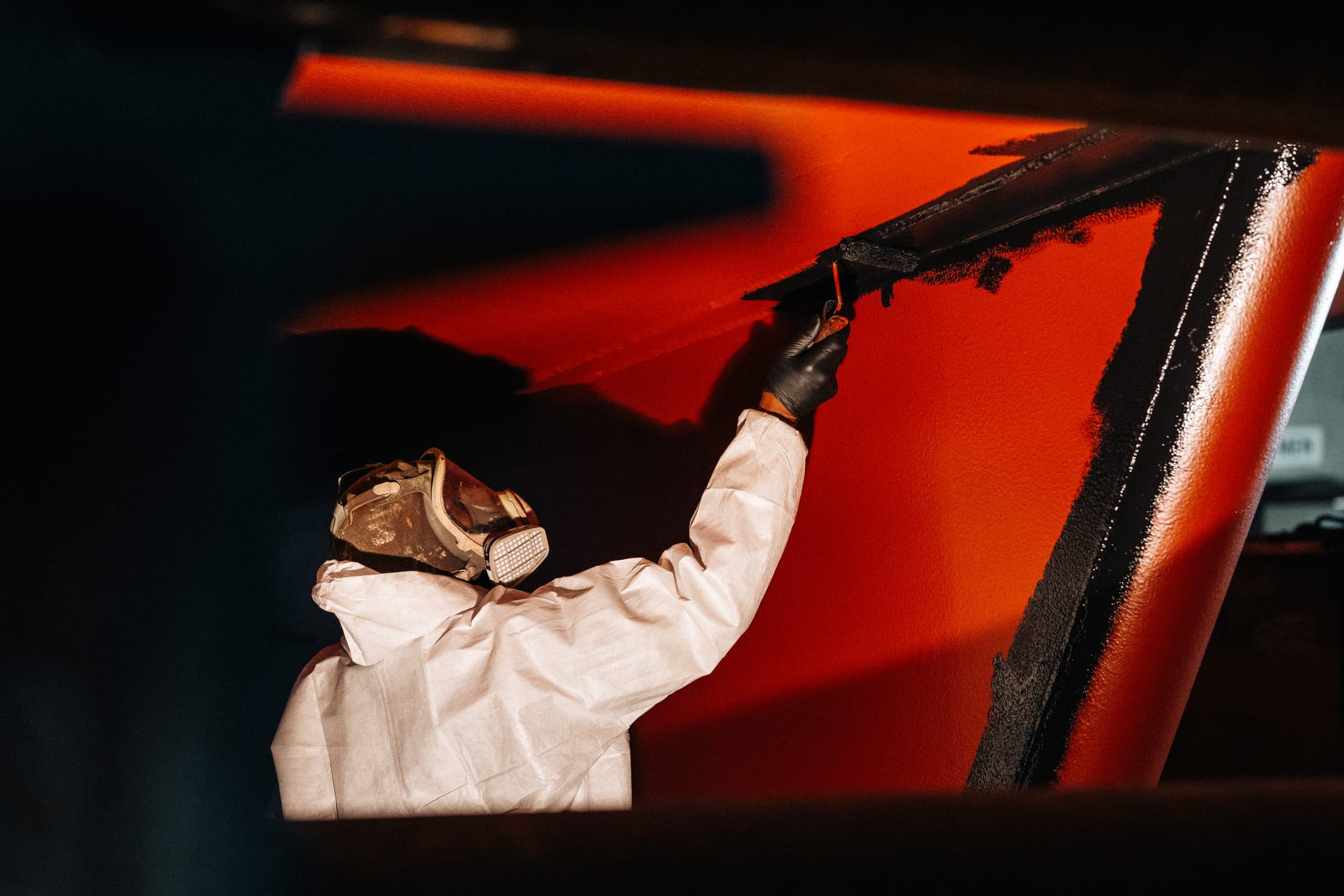 Painting the underside of Tuuli C’s hull.