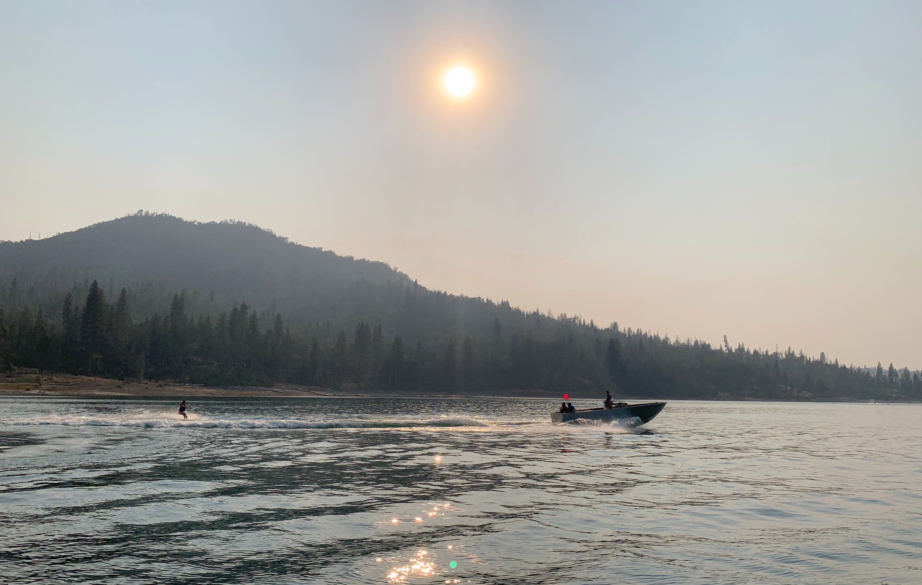 Testing an early skeleton boat for performance, including wake sport potential.