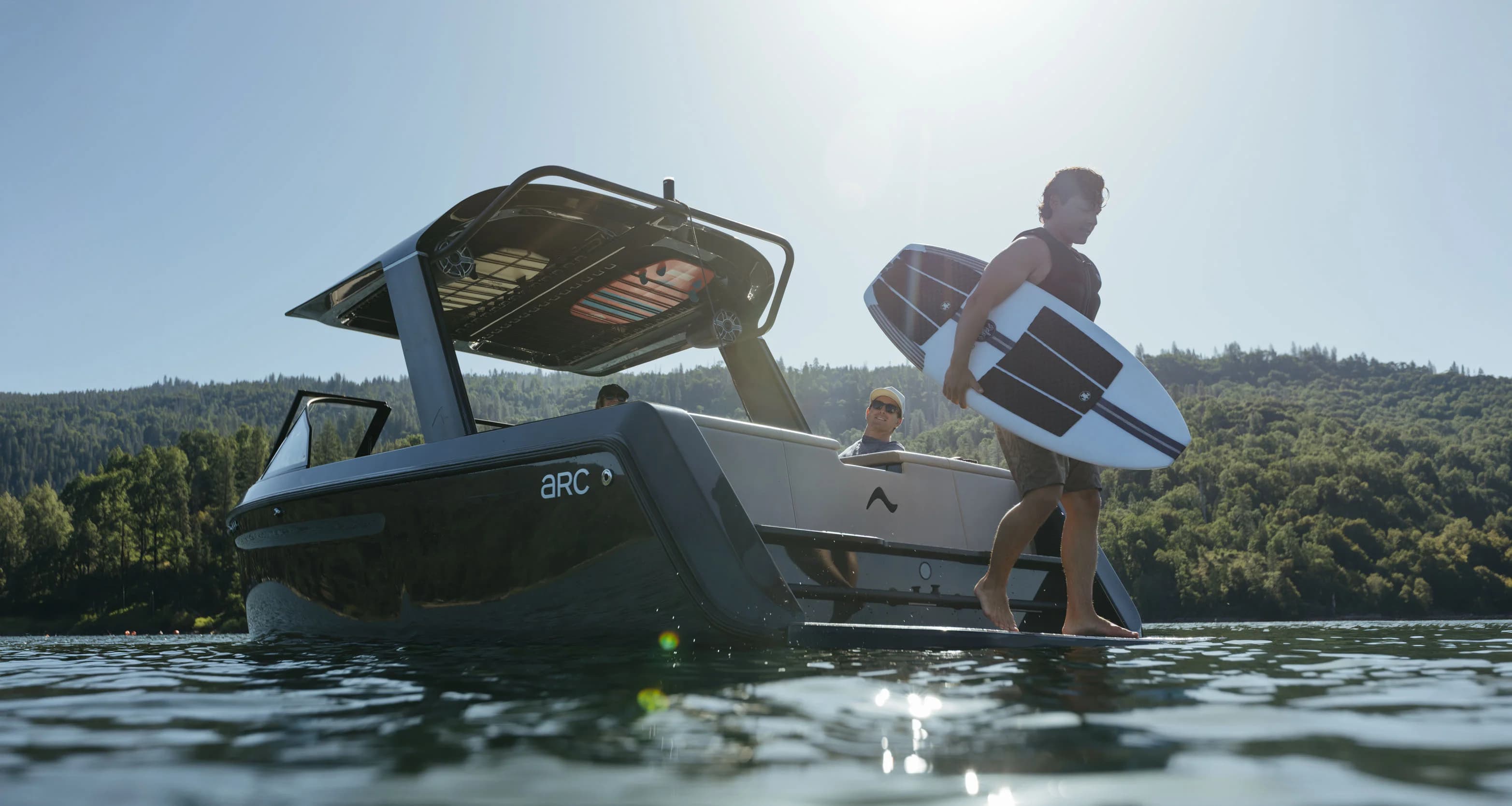 A photograph of an EV boat zipping through the water