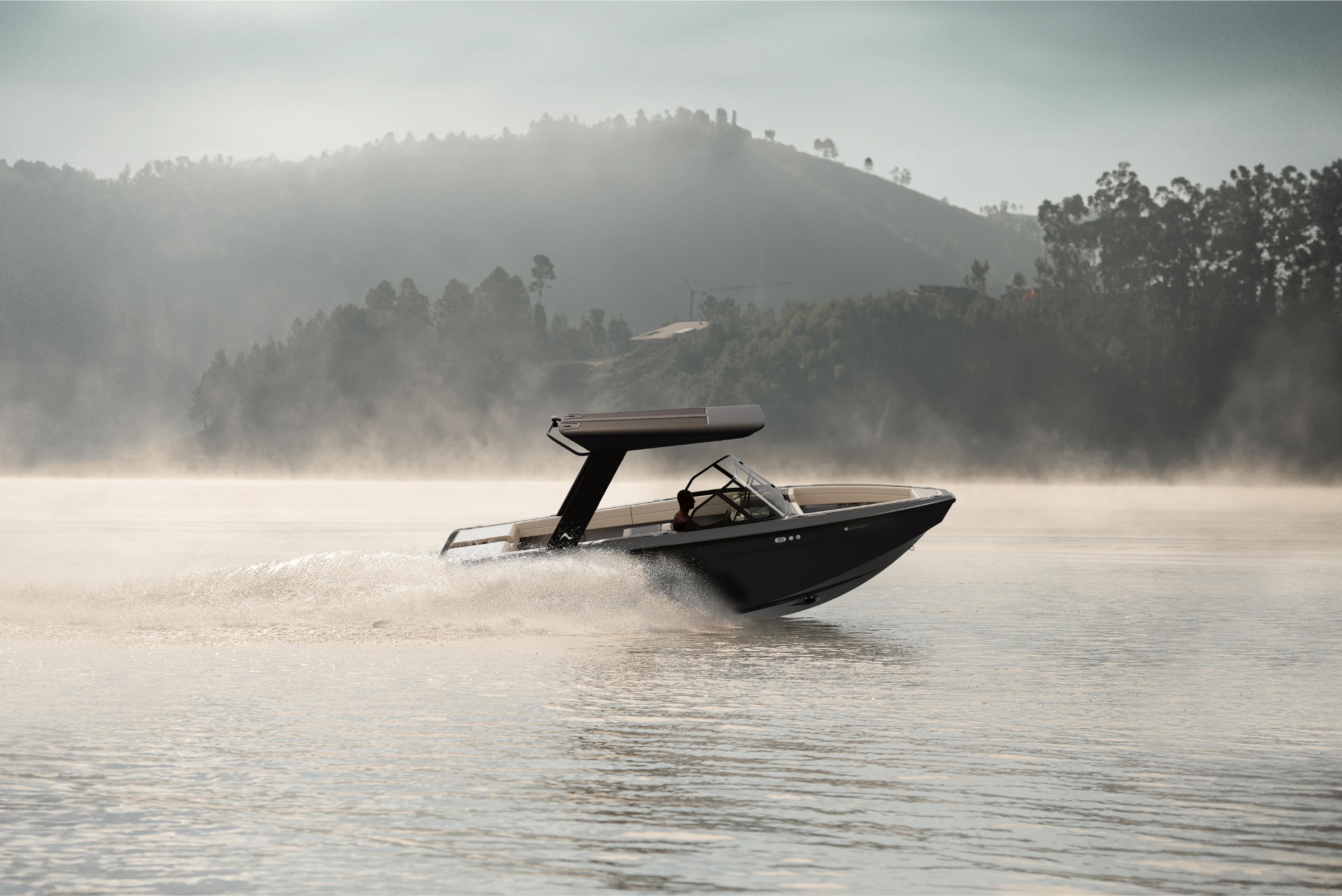 A dramatic image of an Arc Sport quickly turning on a misty lake in the morning
